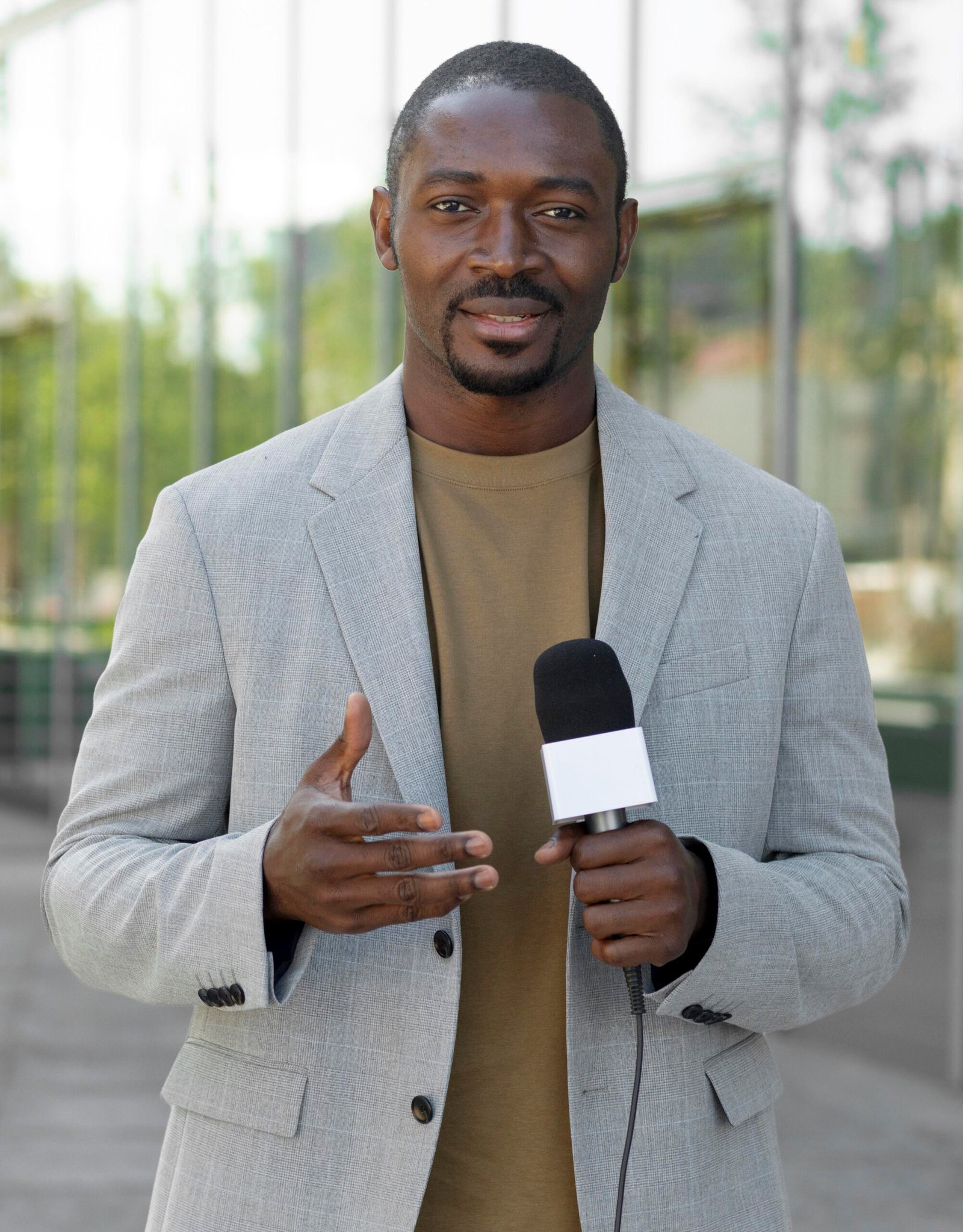 Front View Formal Male Journalist 1 Scaled